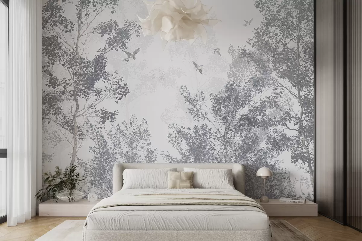 murales de pared Árboles azules desnudos con ramas y estampado suave contra un cielo brumoso y nublado con pájaros voladores w07982v1