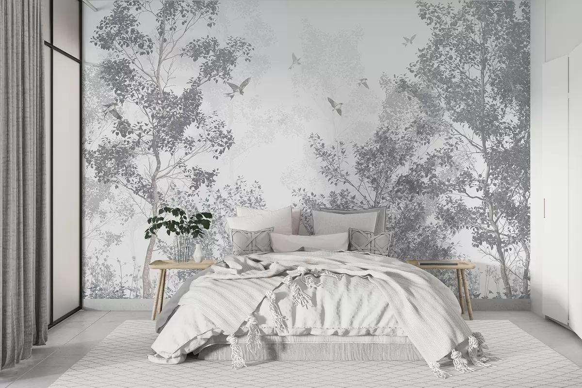 murales de pared Árboles azules desnudos con ramas y estampado suave contra un cielo brumoso y nublado con pájaros voladores w07982v1